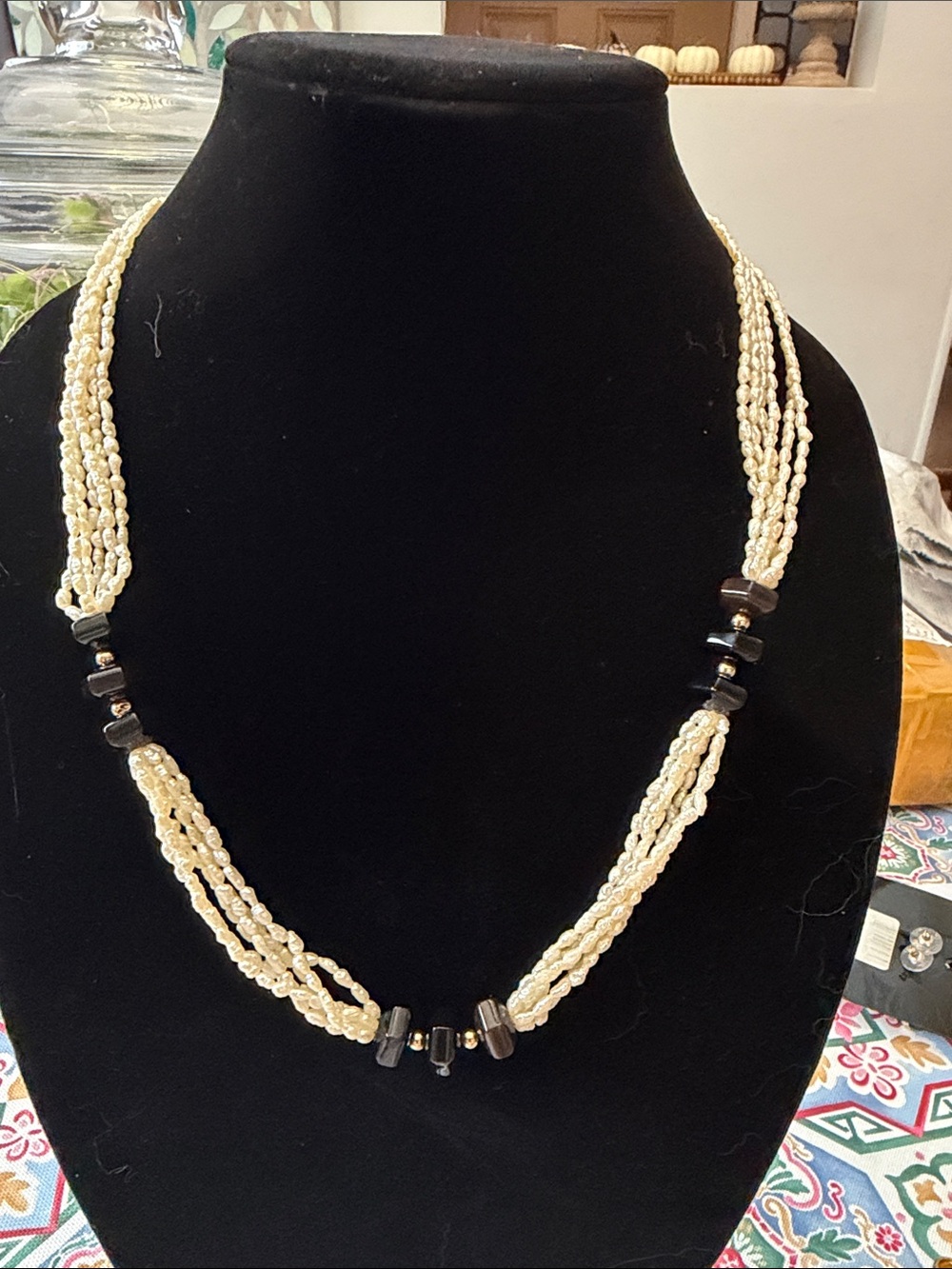 Very LongCream Beaded Rice PearlsNecklace with Onyx and Gold Tone Accent Beads